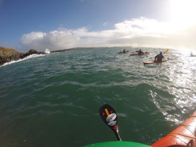 Waves crash upon Dromadoon